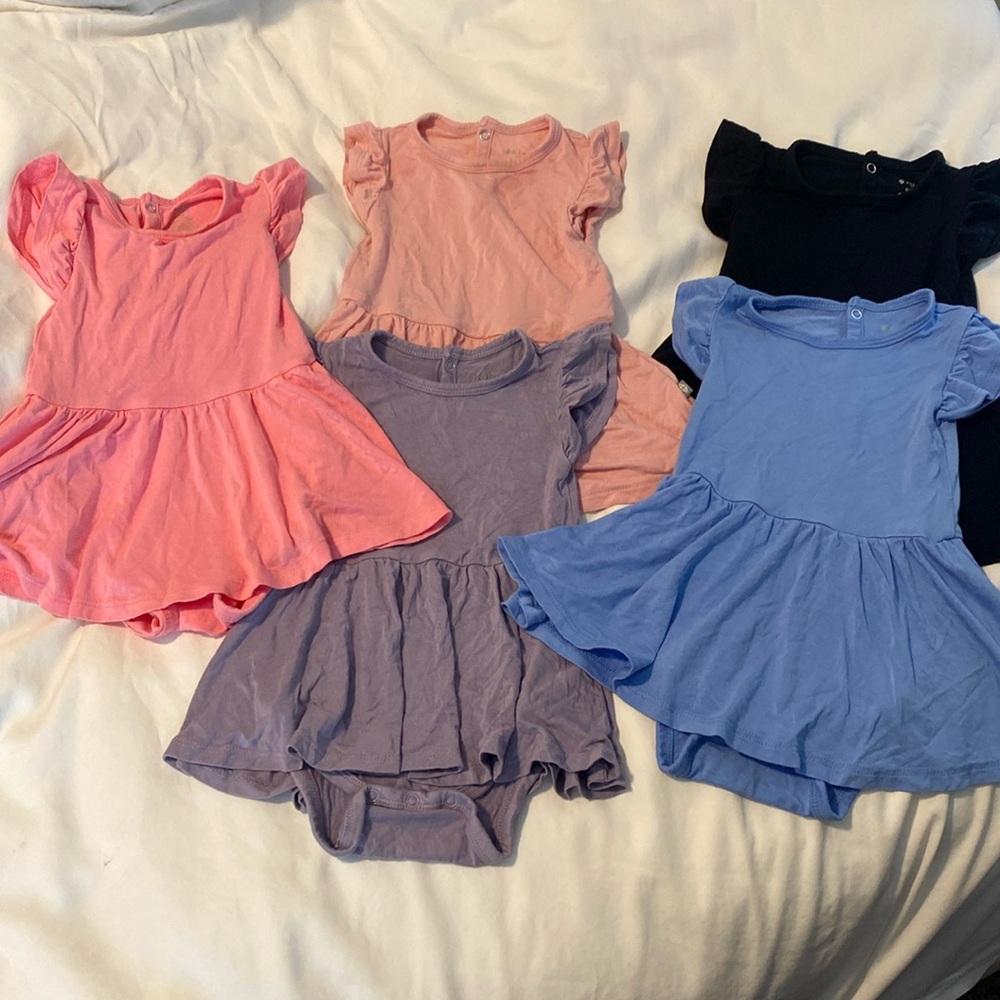 Kyte Baby twirl body suit dresses 6-12 months. 7 pieces